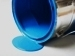 tipped-over can spilling paint