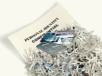 Document shredding Sensitive documents and credit cards being shredded