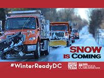Snow plows and Snow Is Coming text